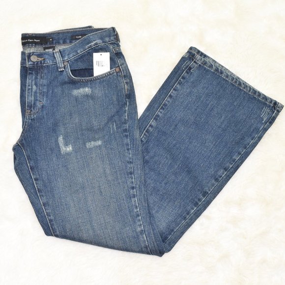 Calvin Klein Jeans Women's Size 10 Distressed Denim Flare Mid Rise Inseam 32 NWT - Picture 2 of 12